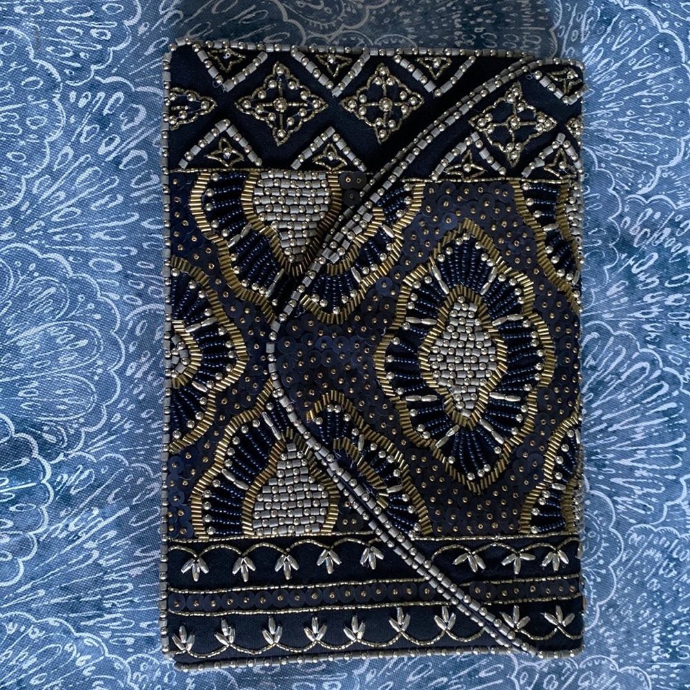 Clutch or shoulder chain purse.